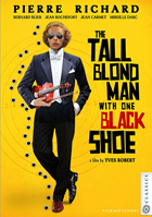 Tall Blond Man With One Black Shoe